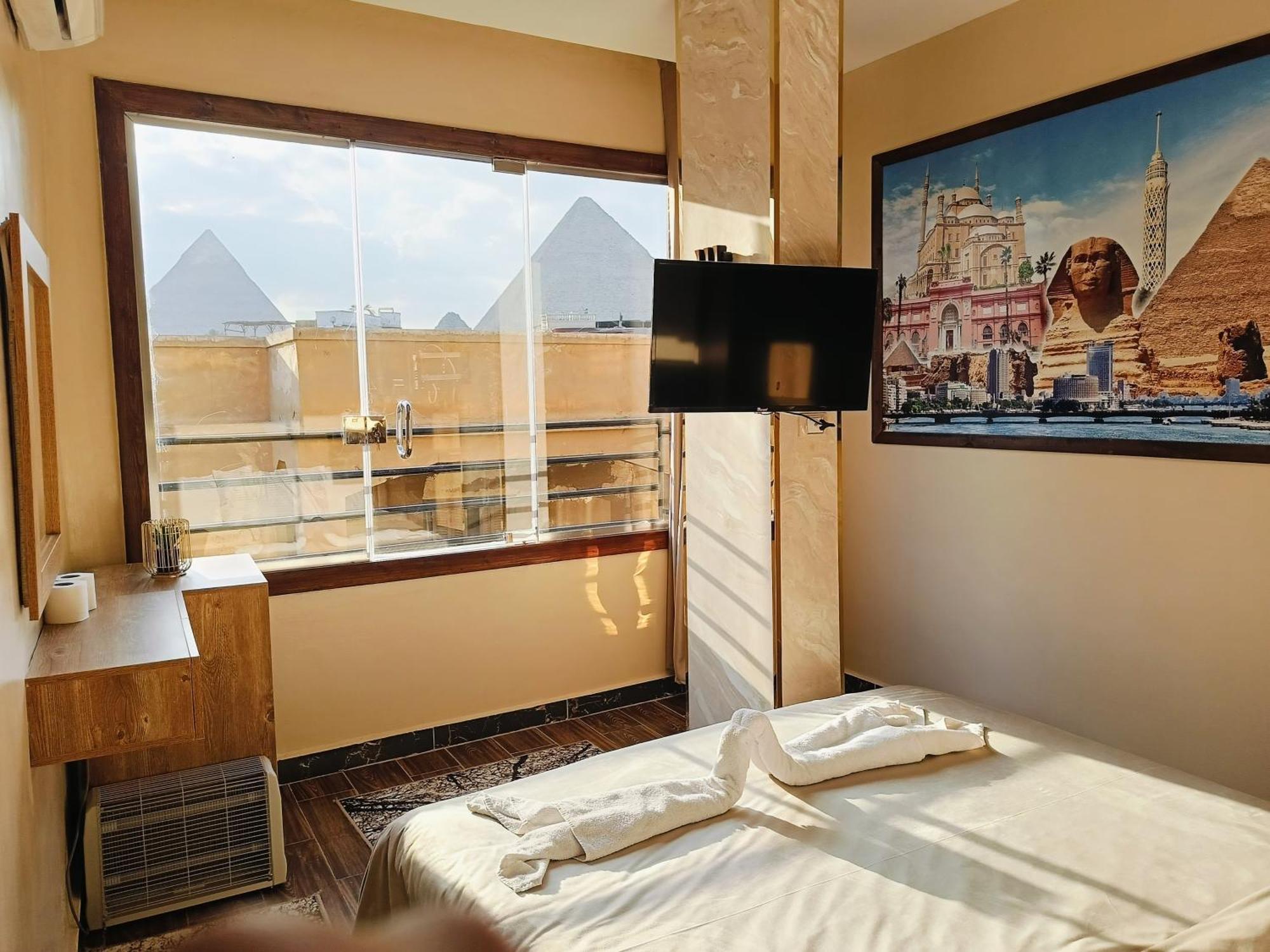 Magic Golden Pyramids View Hotell Kafret el-Gabal Exteriör bild