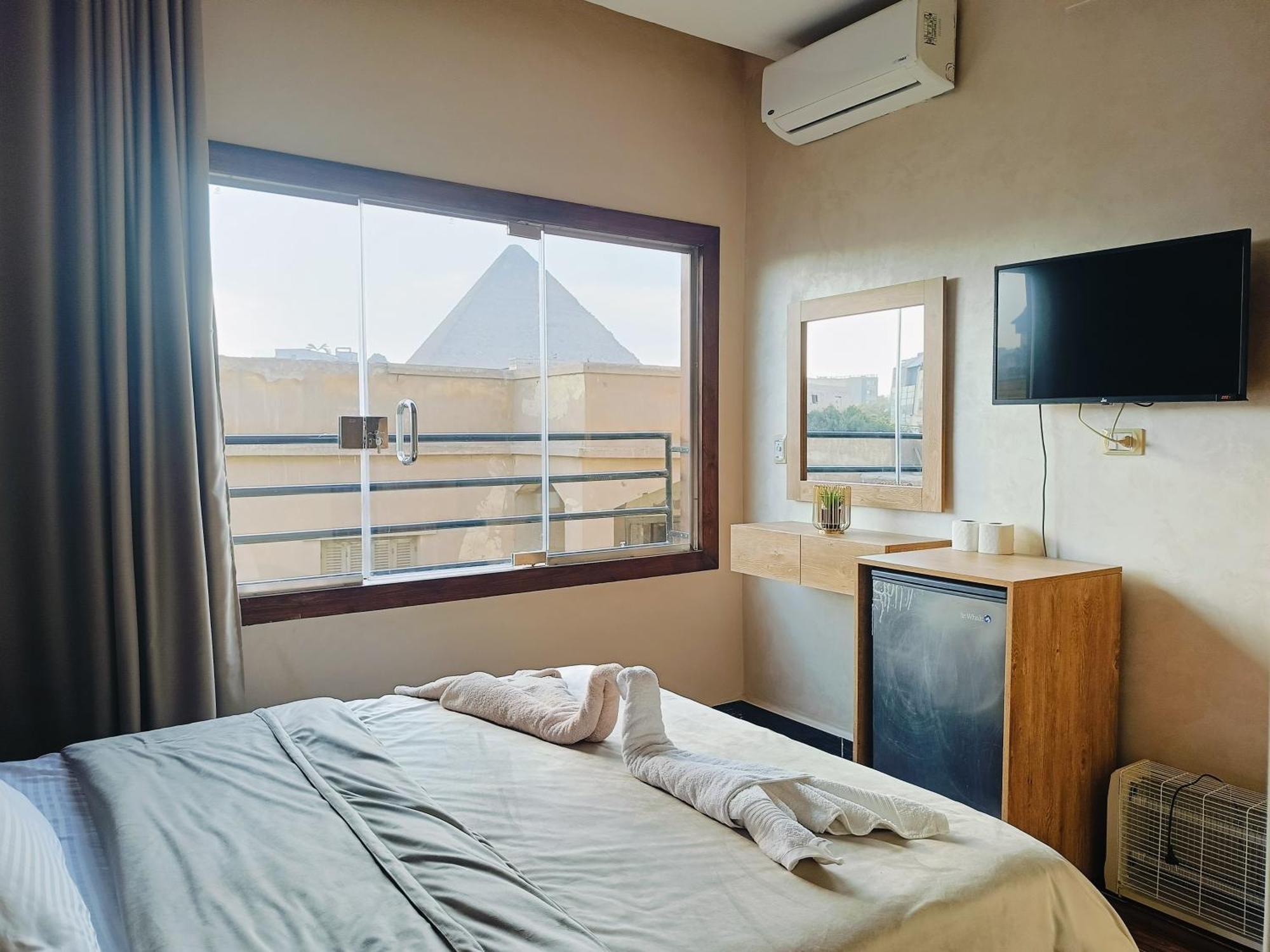 Magic Golden Pyramids View Hotell Kafret el-Gabal Exteriör bild