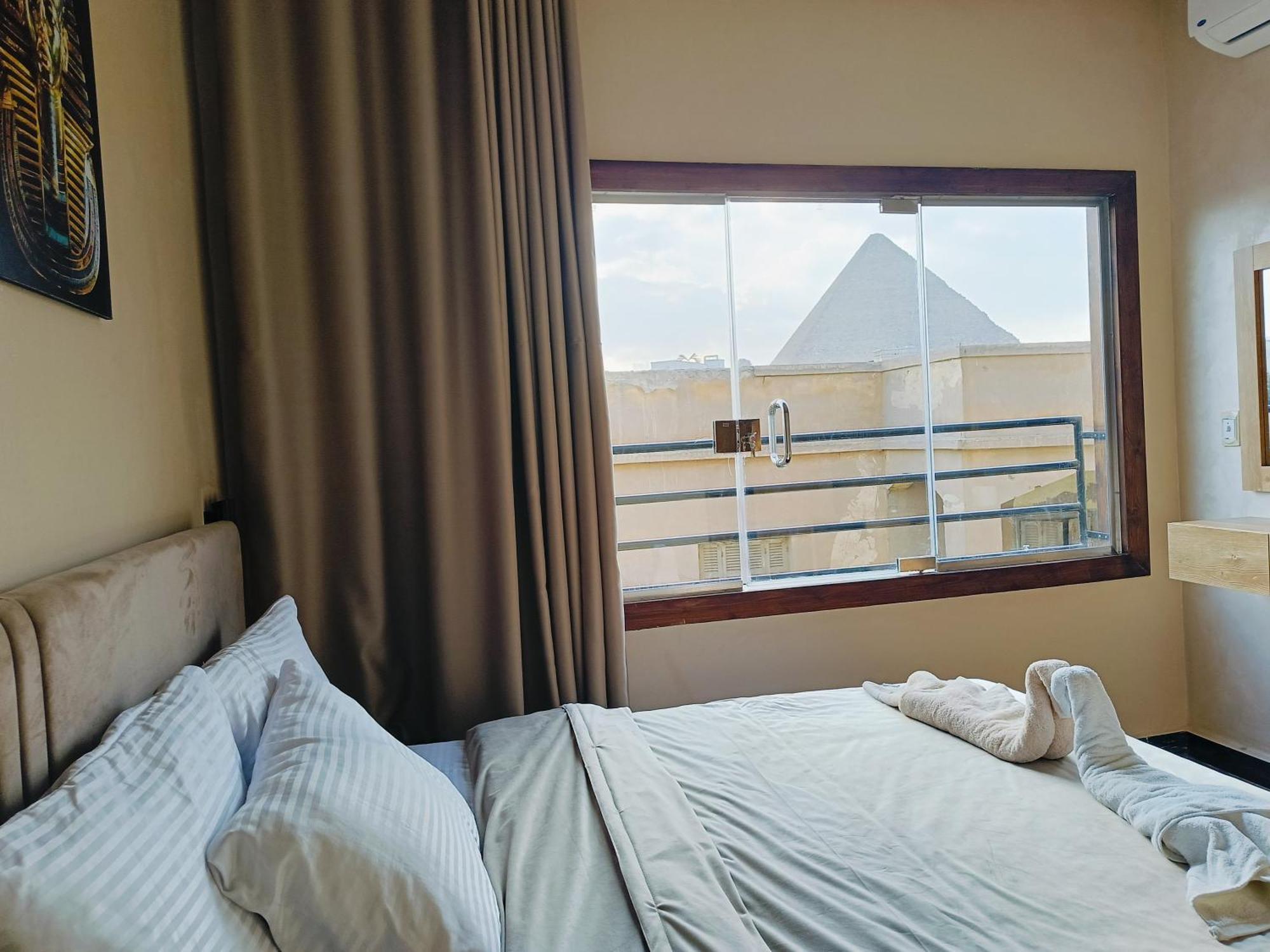 Magic Golden Pyramids View Hotell Kafret el-Gabal Exteriör bild